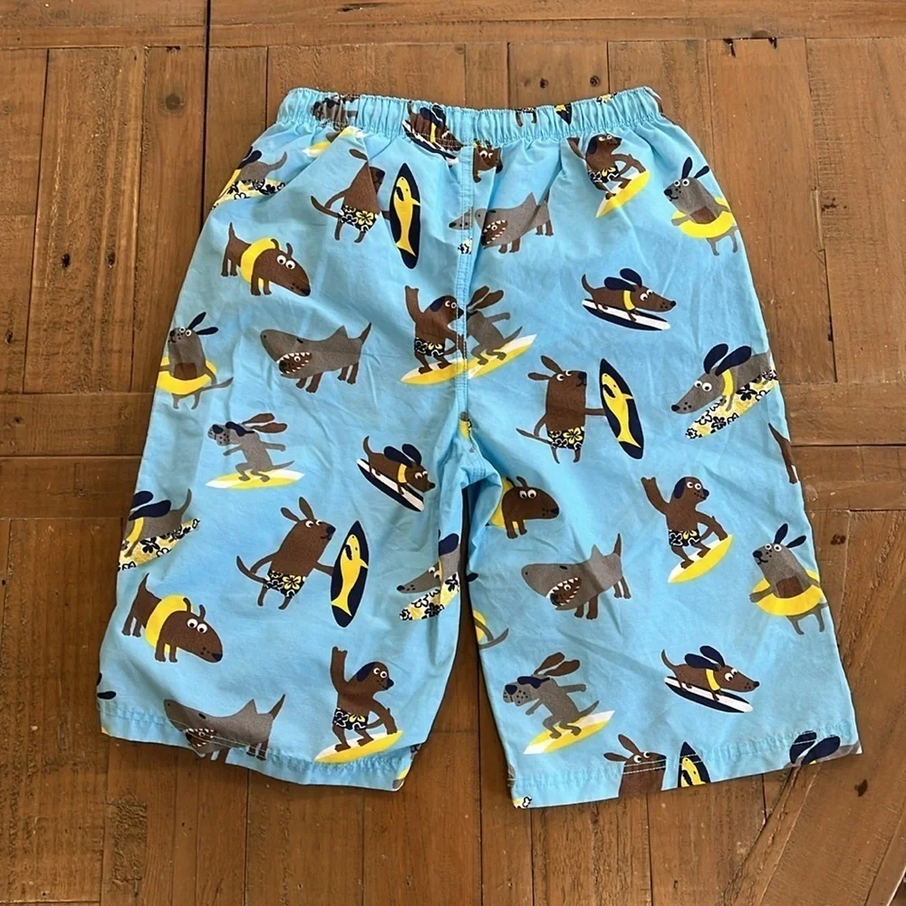 Mini Boden surfing dog swim trunks